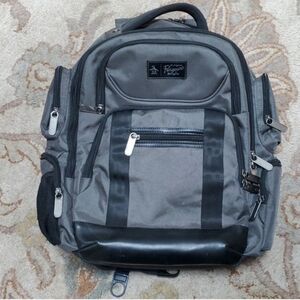 An Original Penguin Odell 9 Pocket Laptop Luggage Backpack